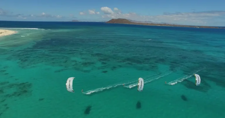 aerial-shot-three-kitesurfers-fuerteventura-spain-1